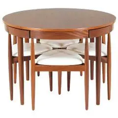 round dining tables with tuck under chairs