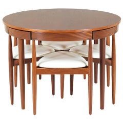 round dining tables with tuck under chairs