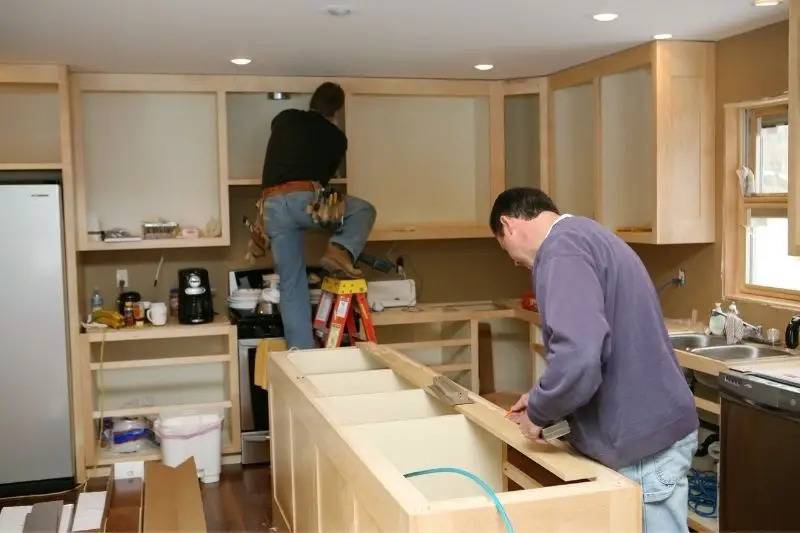 Professionals renovating a kitchen