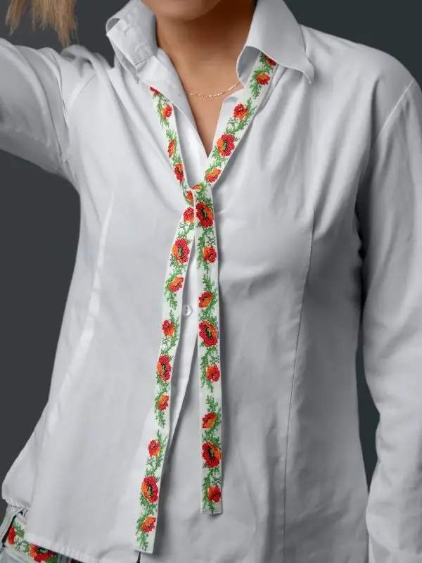 woman wearing embroidered top