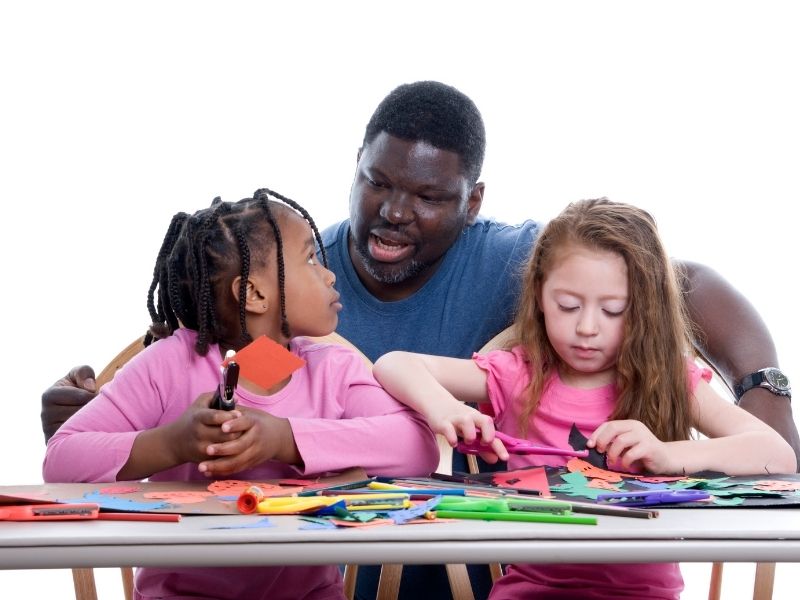 father doing crafts with kids